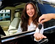 businesswoman receiving keys of her new off-road car